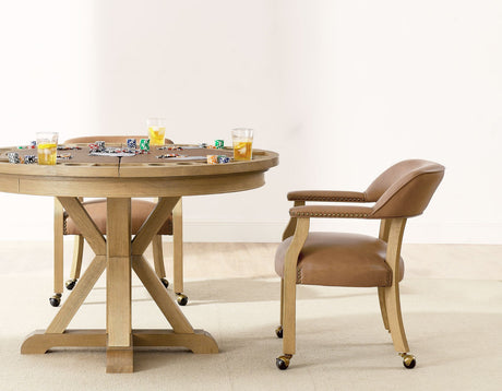 Rylie 48-inch Round Dining Table with Folding Game Top, Natural Finish by Steve Silver at Eve Furniture