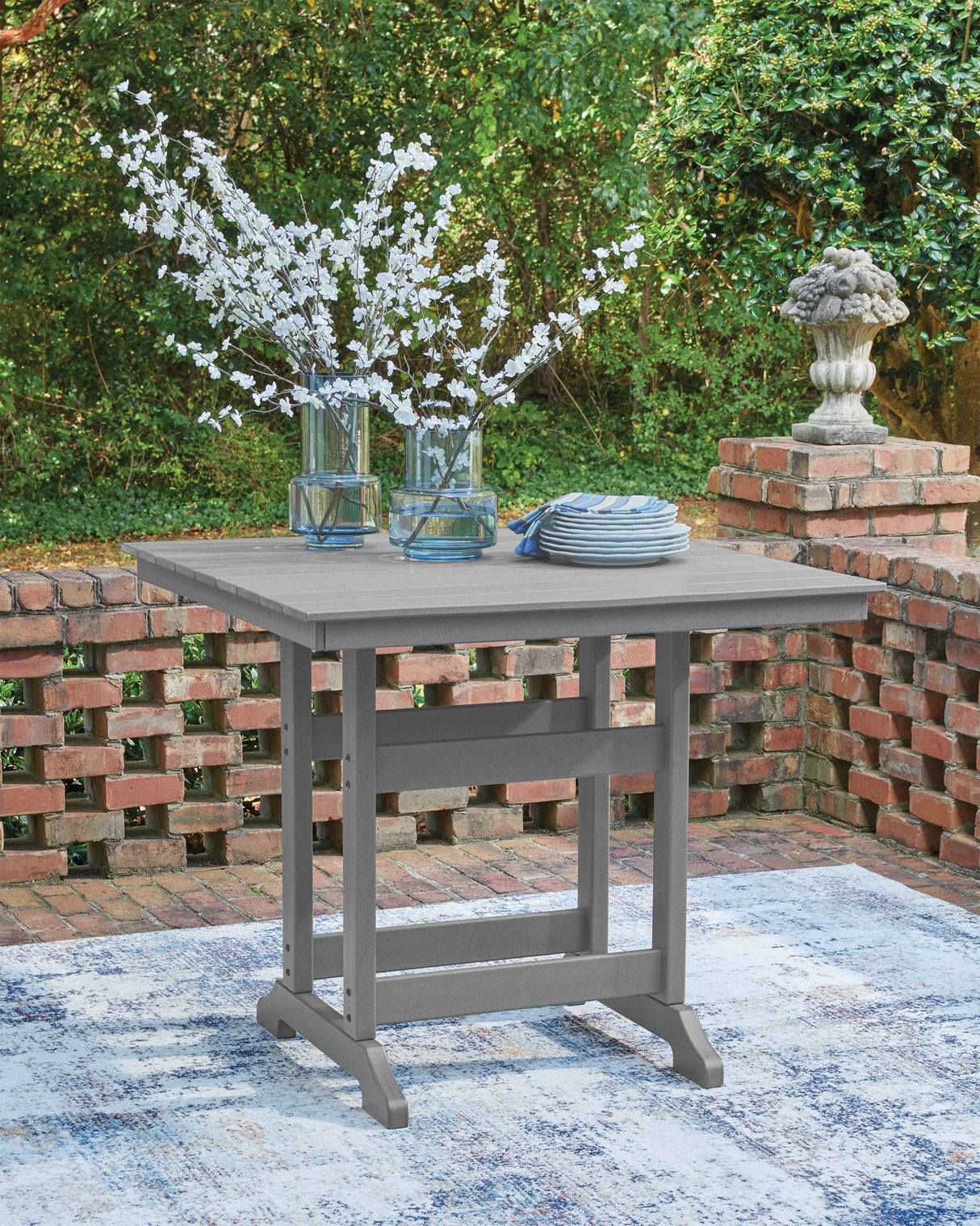 Sanctuary Beach Dark Gray Outdoor Counter Height Dining Set by Ashley at Eve Furniture