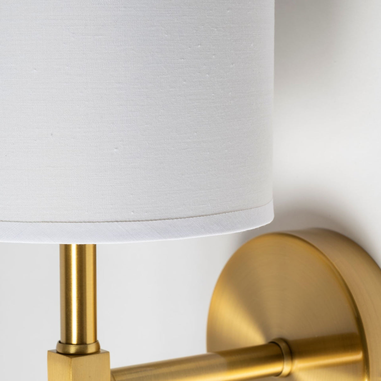 Santander II Gold Metal and White Linen Shade Wall Sconce by Mercana at Eve Furniture
