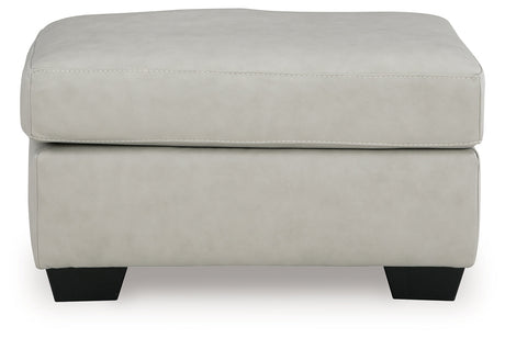 Santorine Bone Ottoman by Ashley at Eve Furniture