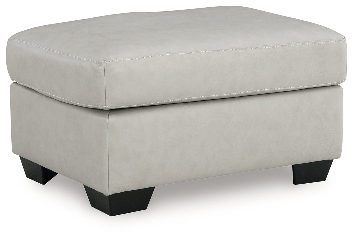 Santorine Bone Ottoman by Ashley at Eve Furniture