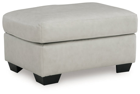 Santorine Bone Ottoman by Ashley at Eve Furniture