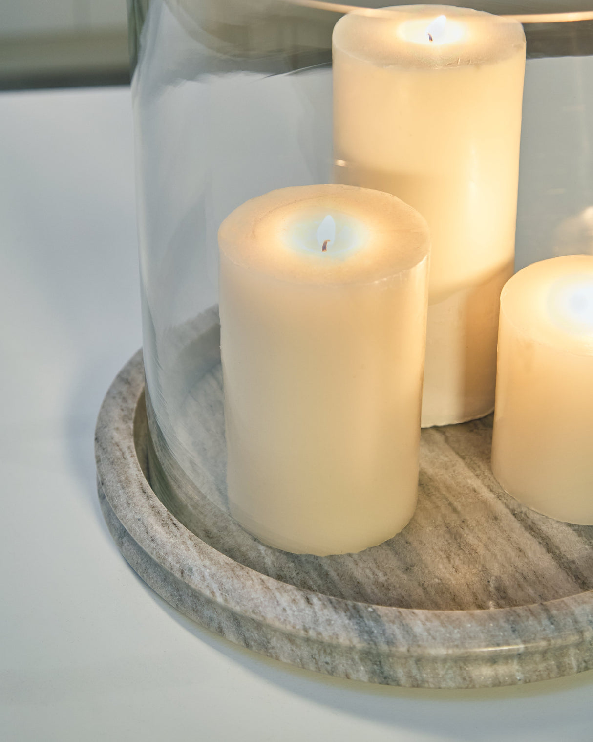 Saskia Clear/Beige Candle Holder by ASHLEY FURNITURE at Eve Furniture