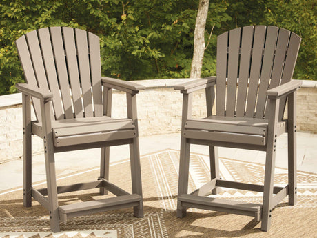 Seacliff Beach Medium Brown Outdoor Counter Height Bar Stool (Set of 2) by Ashley at Eve Furniture