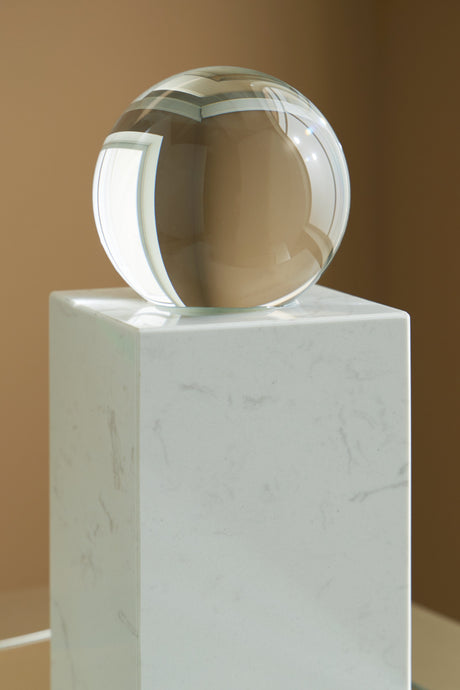 Sellner Clear/White Sculpture by Ashley at Eve Furniture