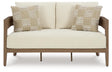 Serene Bay Dark Brown/White Outdoor Loveseat with Cushion by Ashley at Eve Furniture