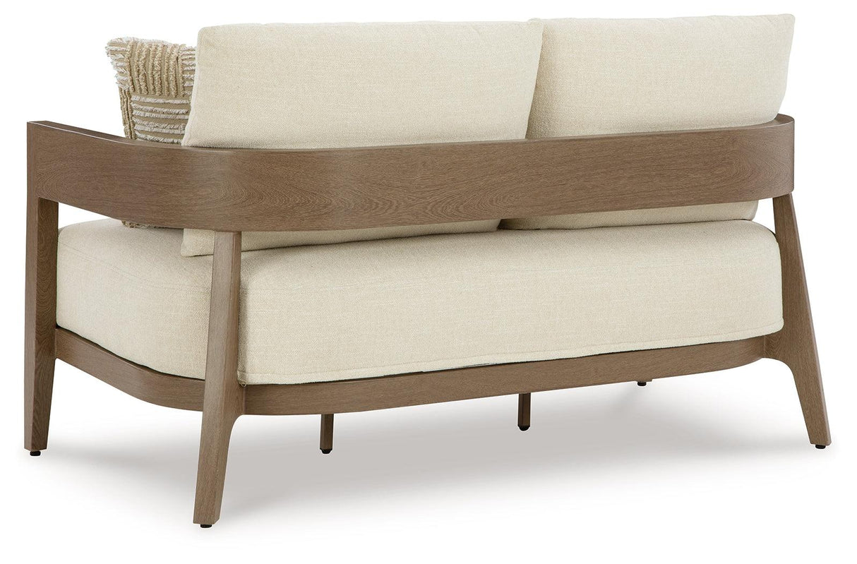 Serene Bay Dark Brown/White Outdoor Loveseat with Cushion by Ashley at Eve Furniture