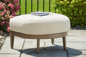 Serene Bay Dark Brown/White Outdoor Ottoman with Cushion by Ashley at Eve Furniture