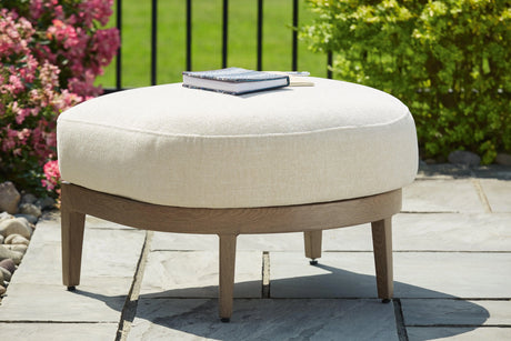 Serene Bay Dark Brown/White Outdoor Ottoman with Cushion by Ashley at Eve Furniture