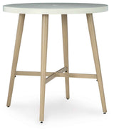Seton Creek Beige Outdoor Bar Table by Ashley at Eve Furniture