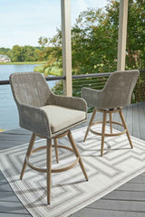 Seton Creek Beige/Gray Outdoor Bar Height Barstool with Cushion (Set of 2) by Ashley at Eve Furniture