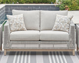 Seton Creek Gray Outdoor Loveseat with Cushion by Ashley at Eve Furniture