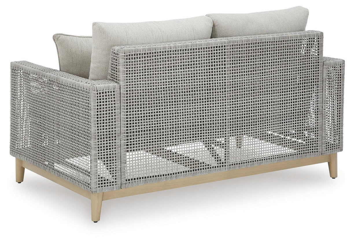 Seton Creek Gray Outdoor Loveseat with Cushion by Ashley at Eve Furniture
