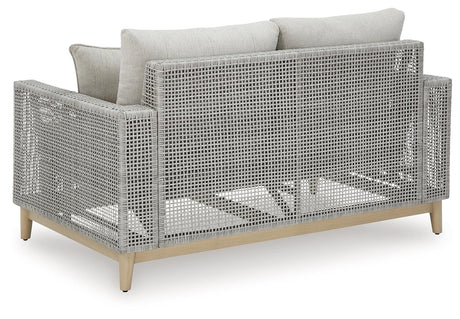 Seton Creek Gray Outdoor Loveseat with Cushion by Ashley at Eve Furniture
