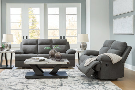 Side-Swipe Charcoal Manual Reclining Sofa & Loveseat by Ashley at Eve Furniture