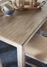 Skempton White/Light Brown Counter Height Dining Table and 4 Barstools by Ashley at Eve Furniture