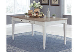 Skempton White/Light Brown Dining Table by Ashley at Eve Furniture