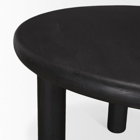 Soma Textured Black Mango Wood Round Dining Table by Mercana at Eve Furniture