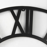Stoke Round Black Iron Wall Clock by Mercana at Eve Furniture