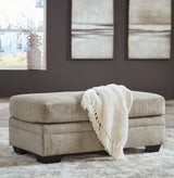 Stonemeade Taupe Ottoman by Ashley at Eve Furniture