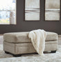 Stonemeade Taupe Ottoman by Ashley at Eve Furniture
