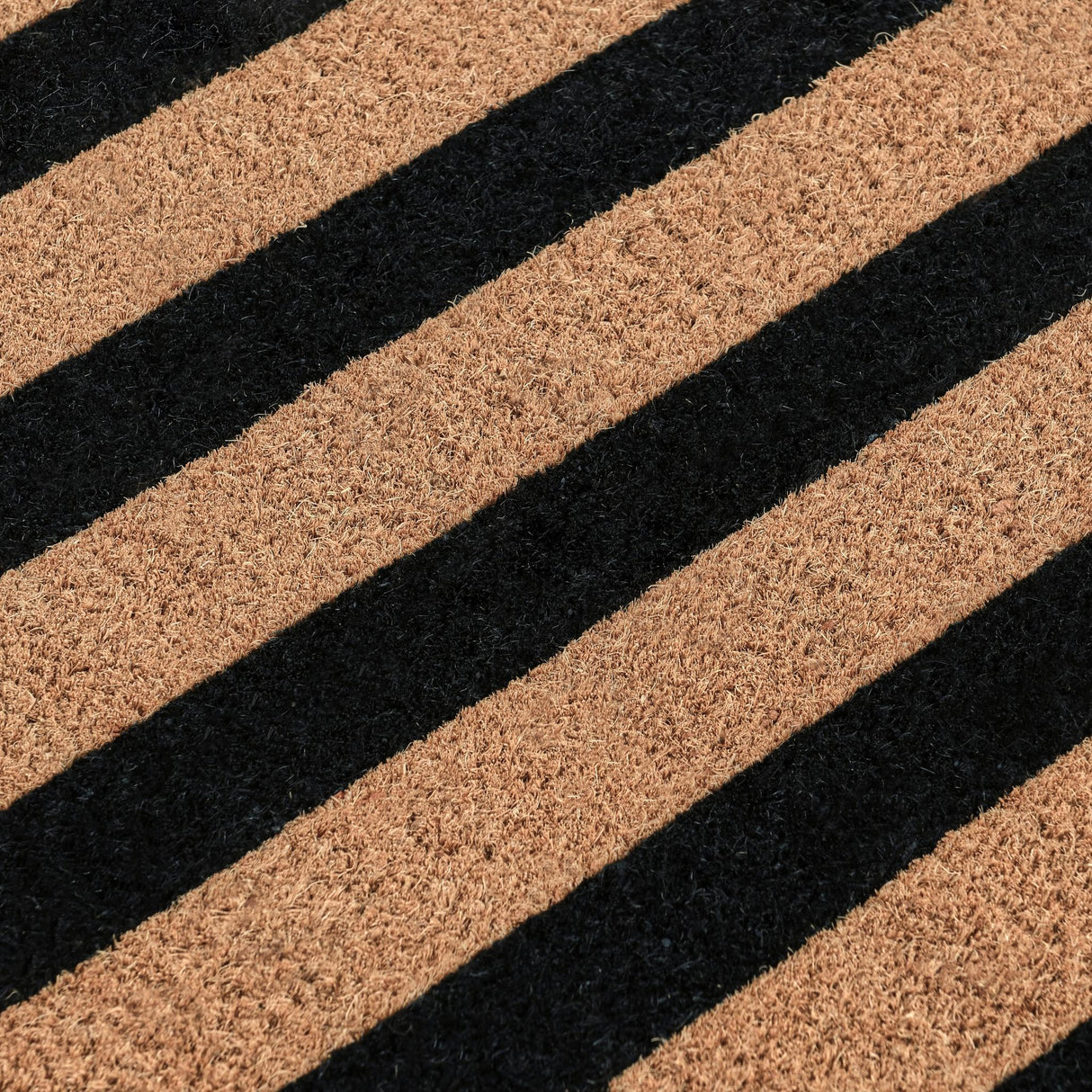 Striped Black/Natural 24x57 Doormat by Classic Home at Eve Furniture