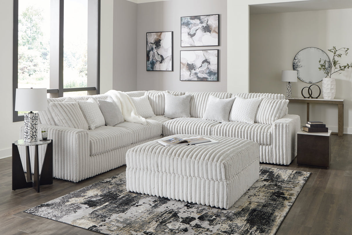 Stupendous 3-Piece Sectional with Ottoman in Alloy by Ashley at Eve Furniture