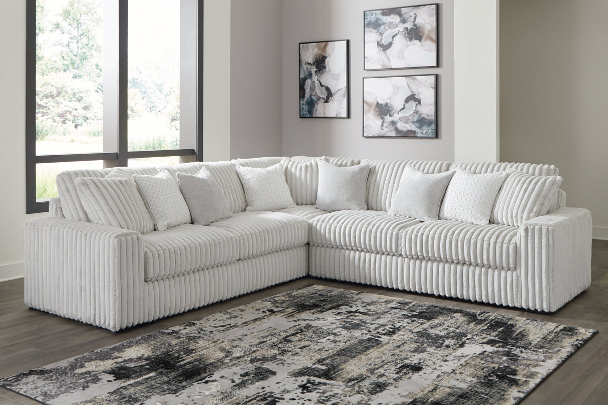Stupendous 3-Piece Sectional with Ottoman in Alloy by Ashley at Eve Furniture