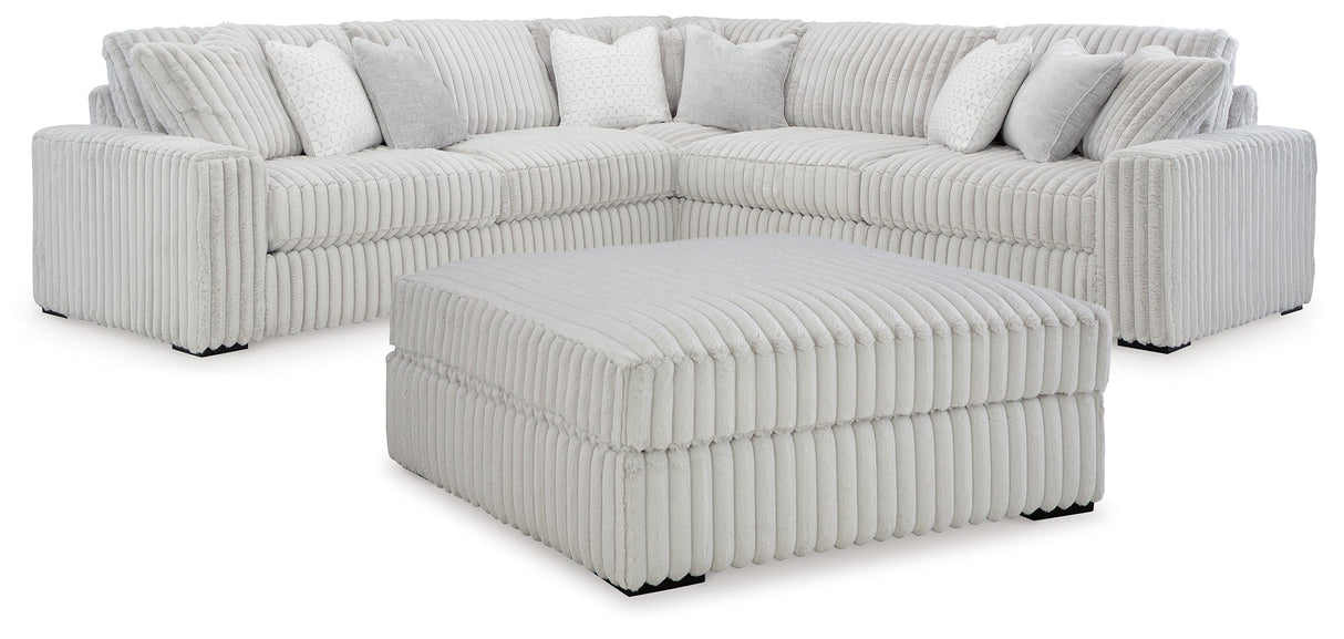 Stupendous 3-Piece Sectional with Ottoman in Alloy by Ashley at Eve Furniture