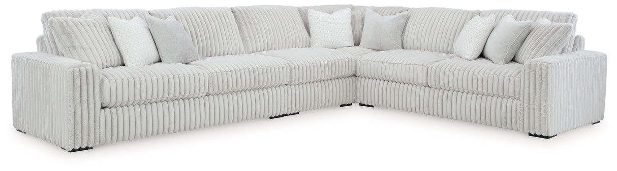 Stupendous 4-Piece Sectional with Ottoman in Alloy by Ashley at Eve Furniture