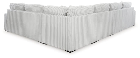 Stupendous 4-Piece Sectional with Ottoman in Alloy by Ashley at Eve Furniture