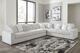 Stupendous 4-Piece Sectional with Ottoman in Alloy by Ashley at Eve Furniture