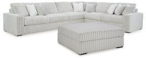 Stupendous 4-Piece Sectional with Ottoman in Alloy by Ashley at Eve Furniture