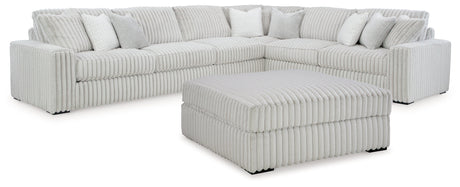 Stupendous 4-Piece Sectional with Ottoman in Alloy by Ashley at Eve Furniture