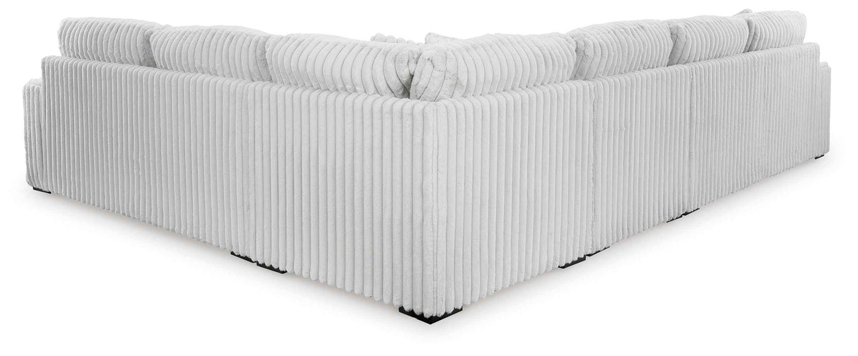 Stupendous Alloy 4-Piece Sectional with Ottoman by Ashley at Eve Furniture