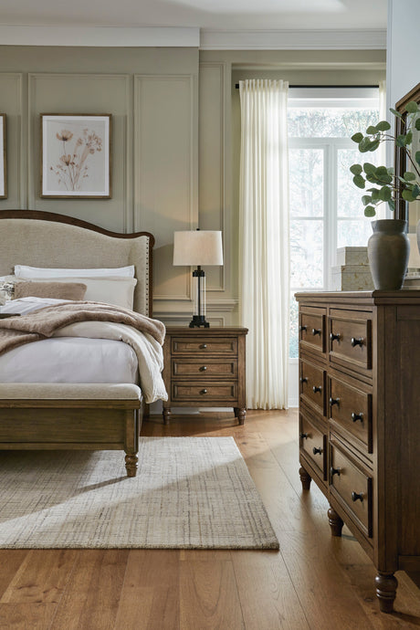 Sturlayne Brown King Upholstered Panel Bed with Footboard Bench by Ashley at Eve Furniture