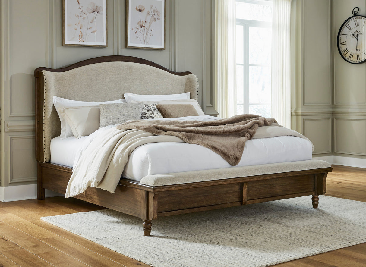 Sturlayne Brown King Upholstered Panel Bed with Footboard Bench by Ashley at Eve Furniture