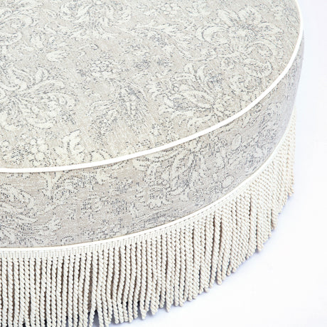 Tassy Tasseled Round Ottoman by TOV Furniture at Eve Furniture