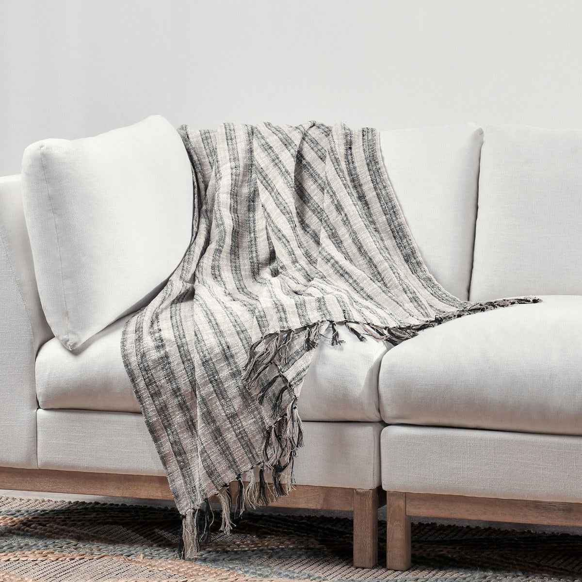 TC Linna Natural/Black Throw 50x70 Throw by Classic Home at Eve Furniture