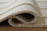 Teelgan Ivory/Tan Extra Large Rug by Ashley at Eve Furniture