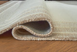 Teelgan Ivory/Tan Extra Large Rug by ASHLEY FURNITURE at Eve Furniture