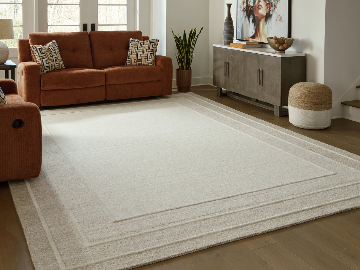 Teelgan Ivory/Tan Extra Large Rug by ASHLEY FURNITURE at Eve Furniture