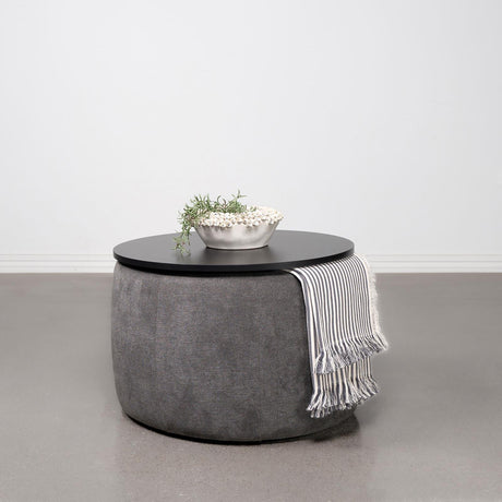 Tesoro Grey and Black Upholstered Round Lift Top Storage Ottoman by Coaster at Eve Furniture
