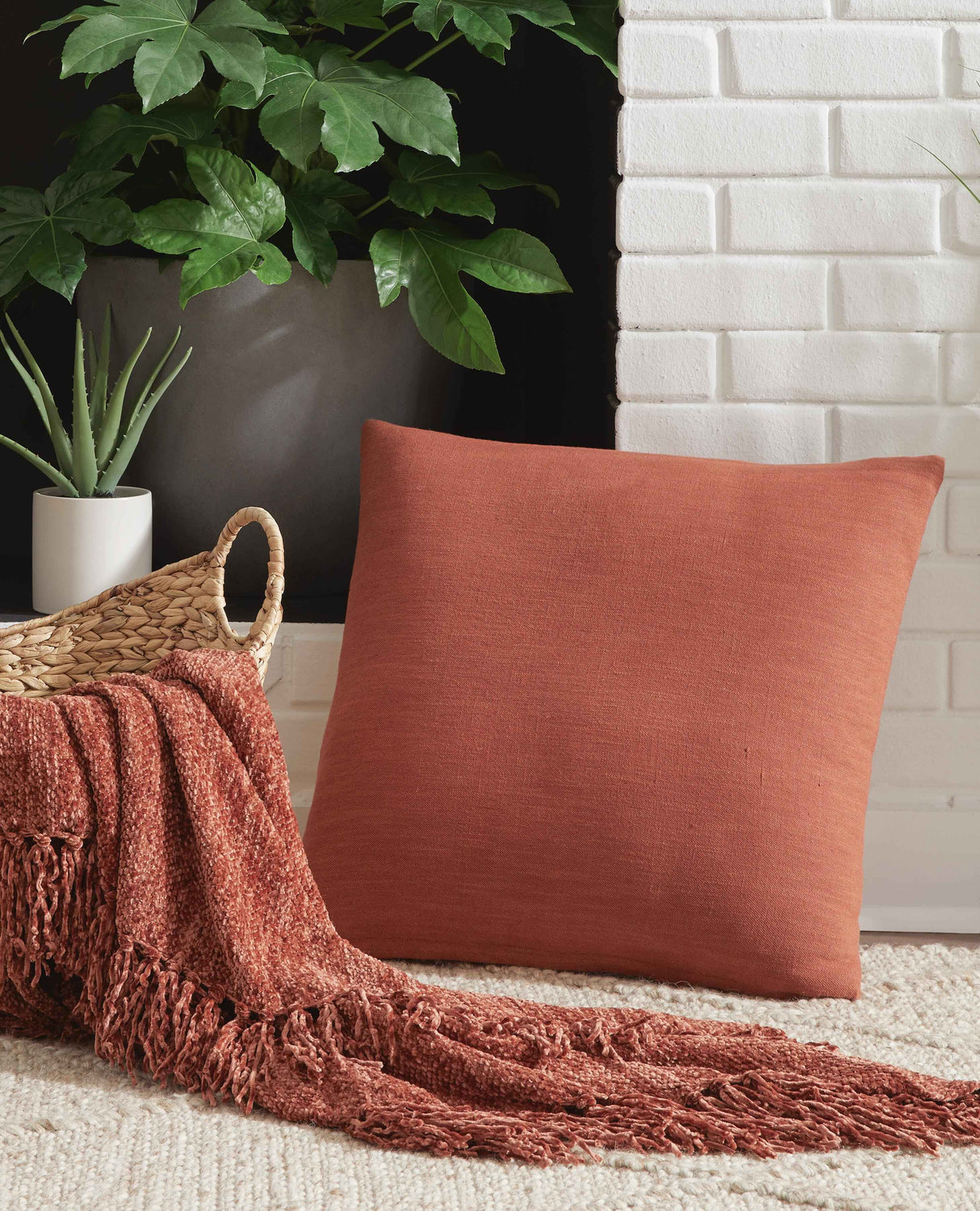 Thaneville Rust Pillow by Ashley at Eve Furniture