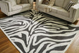 Thomwith Black/Ivory Large Rug by Ashley at Eve Furniture
