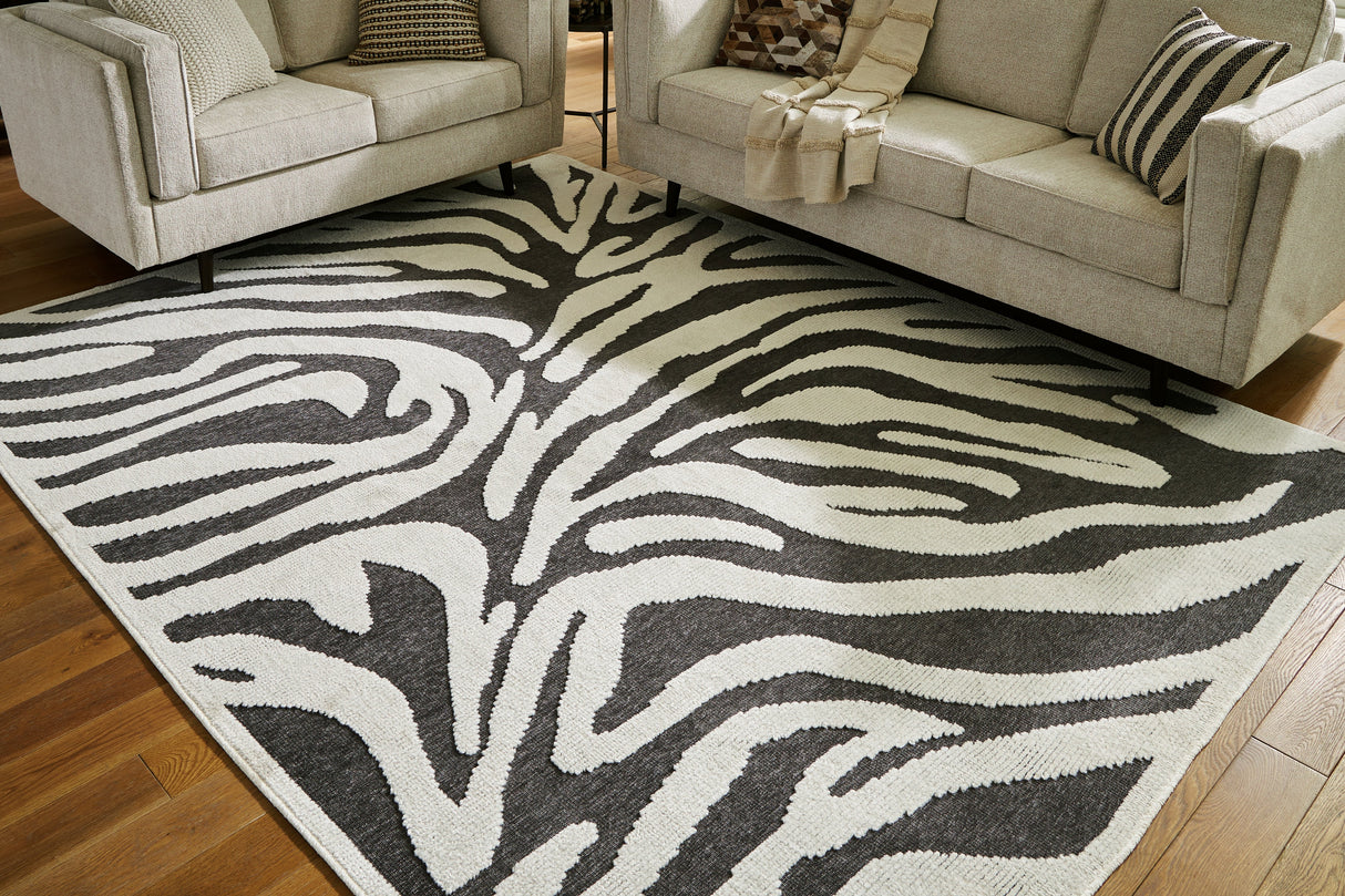 Thomwith Black/Ivory Large Rug by Ashley at Eve Furniture