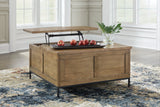 Torlanta Coffee Table with 2 End Tables in Brown by Ashley at Eve Furniture