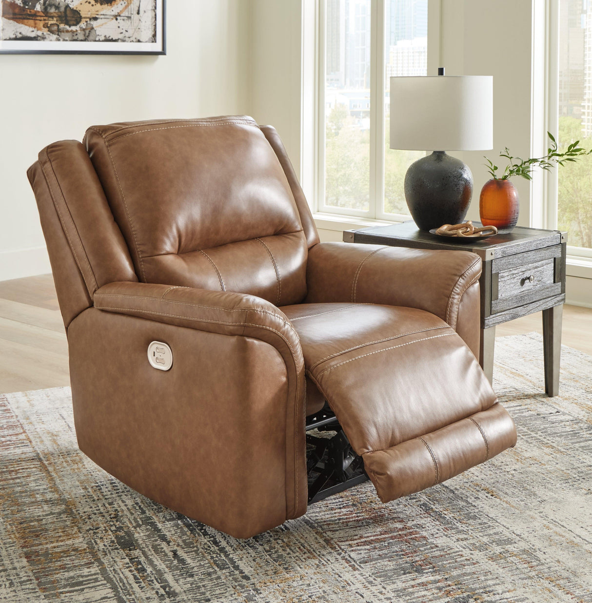 Trasimeno Caramel Dual Power Leather Recliner/ADJ Headrest by Ashley at Eve Furniture