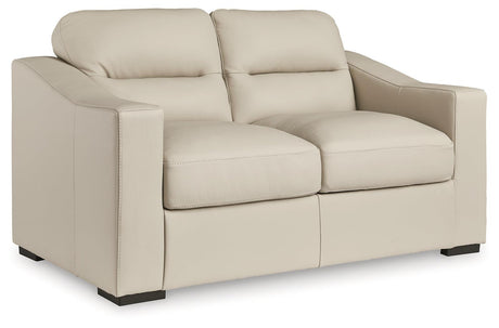 Treasure Trove Almond Loveseat by Ashley at Eve Furniture