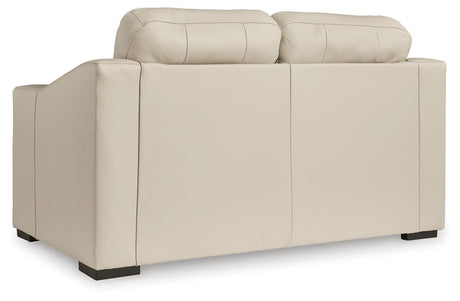Treasure Trove Almond Loveseat by Ashley at Eve Furniture